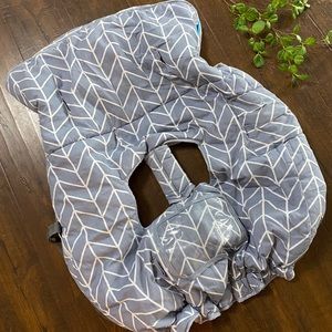 Baby shopping cart cover.